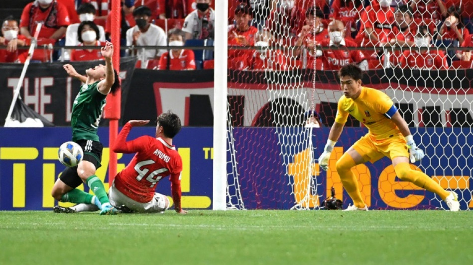 Japan's Urawa win penalty thriller to reach AFC final