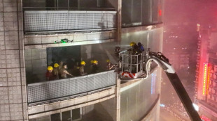 Fire extinguished at China mall, people trapped inside: state media