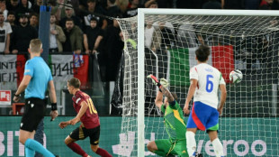 Belgium fight back to draw with 10-man Italy in Nations League