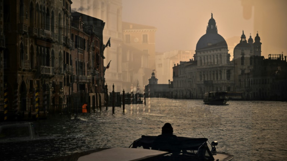 Venice's Grand Canal turns bright green due to fluorescein