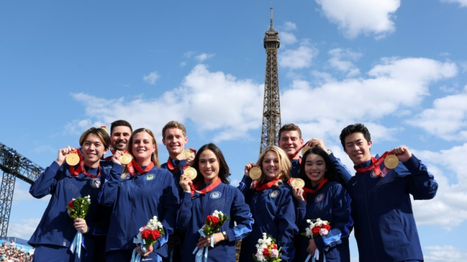 Medals from doping-tainted 2022 Olympic team skating awarded in shadow of Eiffel Tower