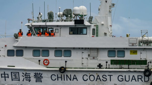 China says took 'control measures' against Philippine ships near disputed reef