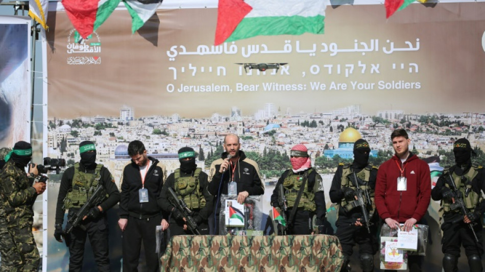 Flanked by gunmen, Israeli hostages face last minute ordeal