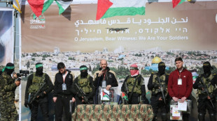 Flanked by gunmen, Israeli hostages face last minute ordeal