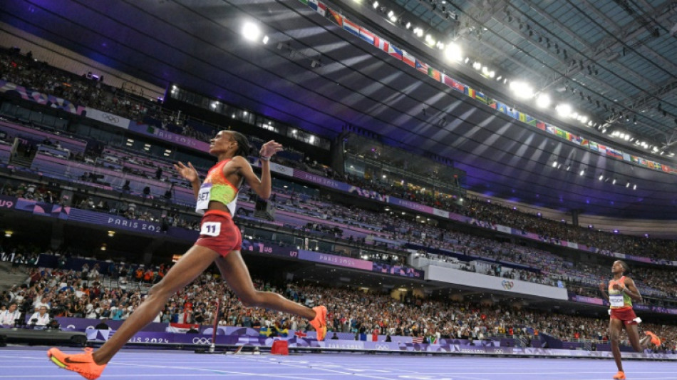 Kenya's 'smiling assassin' Chebet wins Olympic 5,000m gold