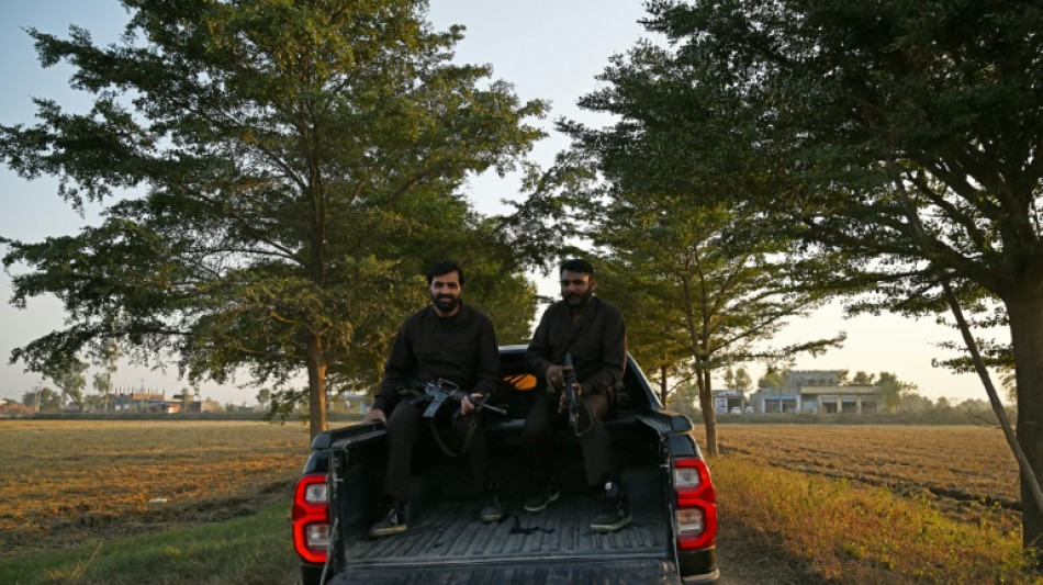 Imposing pickup trucks symbolise Pakistan's power gulf