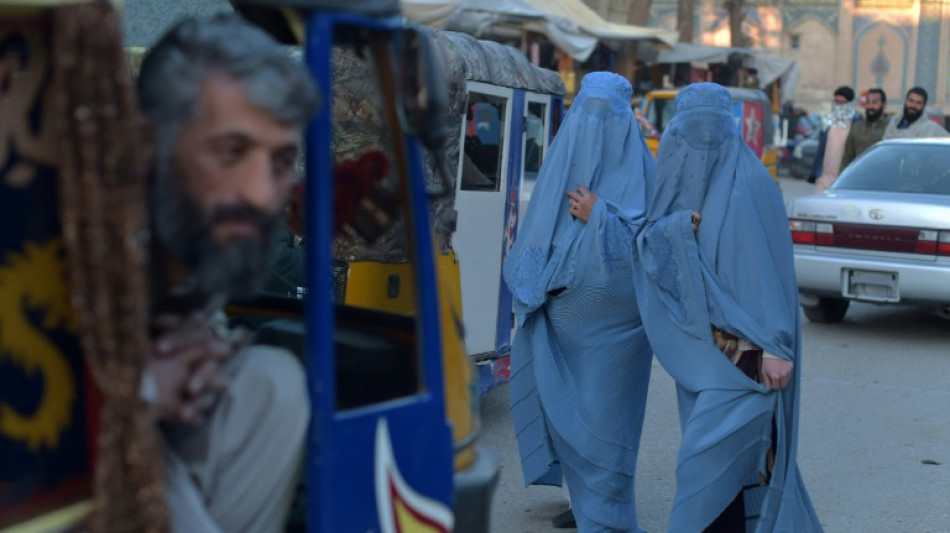 Taliban order Afghan women to cover fully in public