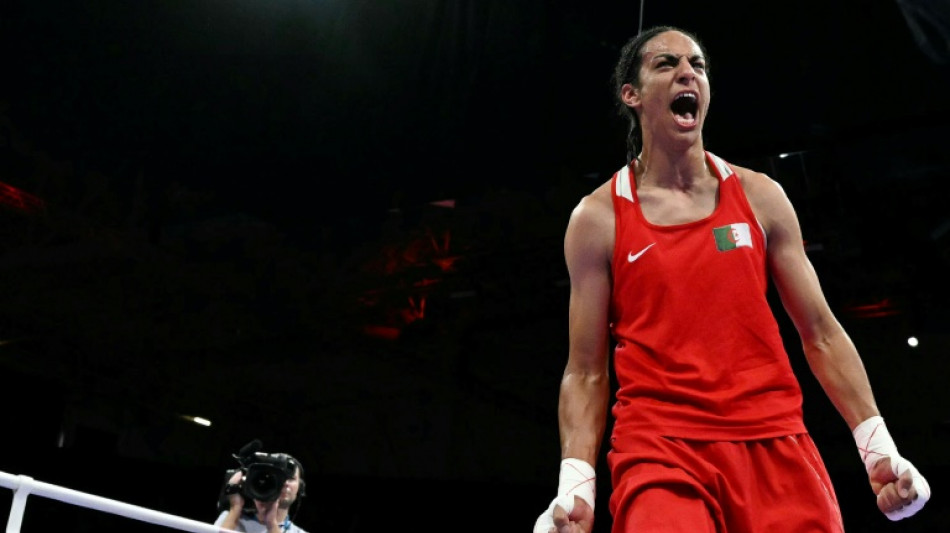 Olympics gender row boxer in tears after winning at least bronze 