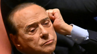 Italy's Berlusconi vows from hospital bed: 'I'll make it'