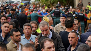 Crowds hurl mud at Spanish king on visit to flood disaster town