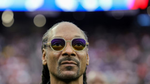 Le rappeur Snoop Dogg consultant lors des JO de Paris pour une chaîne américaine