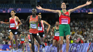 El Bakkali retains Olympic steeplechase title as Girma suffers worrying fall