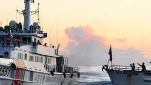 Chinese vessels in high-seas chase of Philippine boat with media