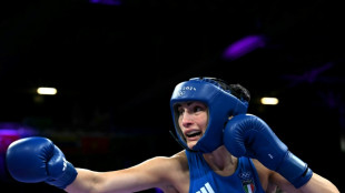 Boxing body offers prize money to beaten Italian amid gender row