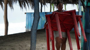 Two killed in Mexico as Hurricane John weakens to tropical storm