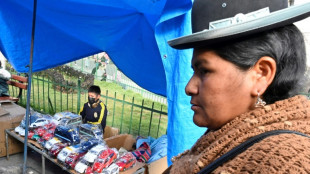 Bolivian inmates pass the time, earn money building miniature cars