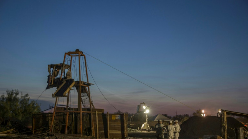 Relatives of trapped Mexican miners pray for miracle