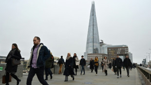 UK unemployment dips but wages hit by inflation