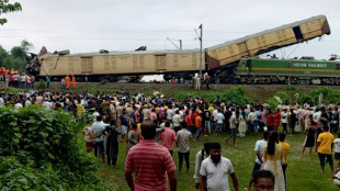 Eight killed in India train crash after driver misses signal