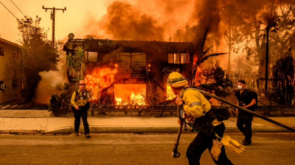 Los Angeles fires rage on as residents sift through 'death and destruction'