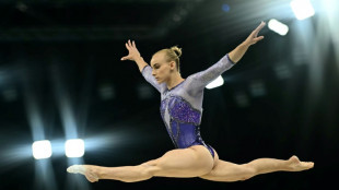 Italy's D'Amato triumphs as Biles falls in 'weird, awkward' balance beam final