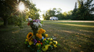 Search for Canada stabbing suspect widens as community mourns