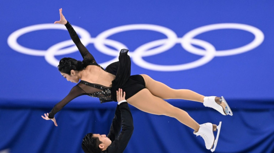 China's Han, Sui break record but face close Olympic figure skating final