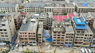 Eighteen trapped, others missing after China building collapse