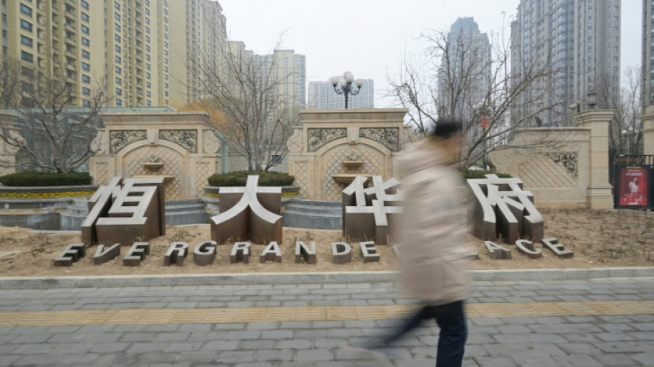 China bans PwC for six months over Evergrande audit