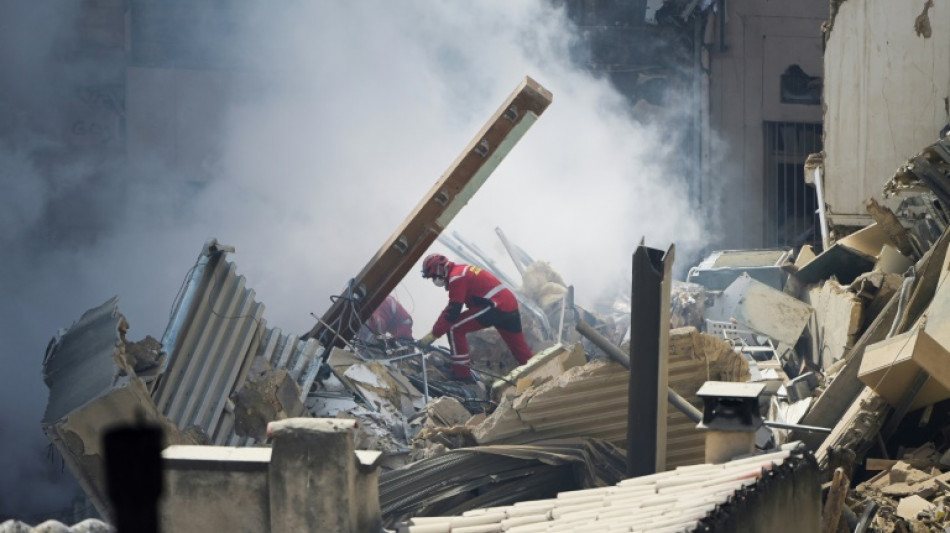 Eight missing after French building collapse