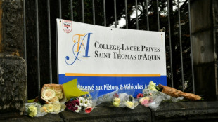 Minute of silence for slain teacher in southwest France