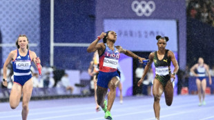 US women take Olympic sprint relay as gender row boxer goes for gold