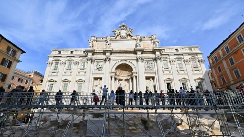 Rome's Trevi Fountain unveils tourist catwalk during cleaning