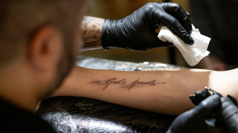 Catholics line up for free tattoos in Austria