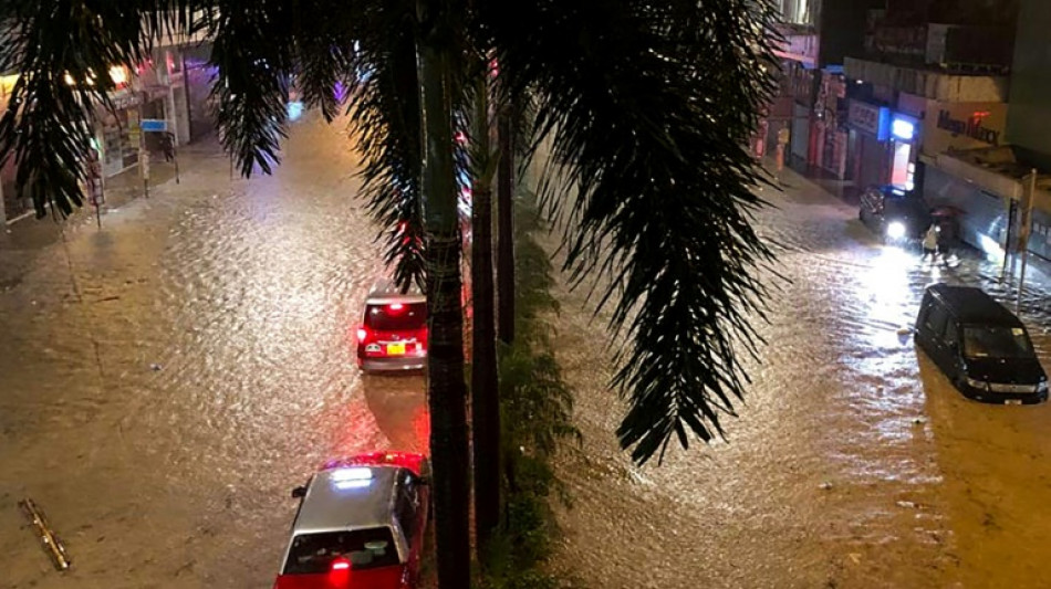 Record rainfall causes flooding in Hong Kong days after typhoon