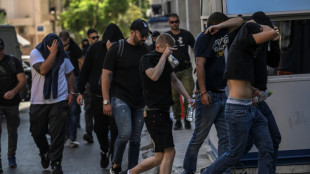 Thirty-five more people charged after fatal stabbing of Greek football fan