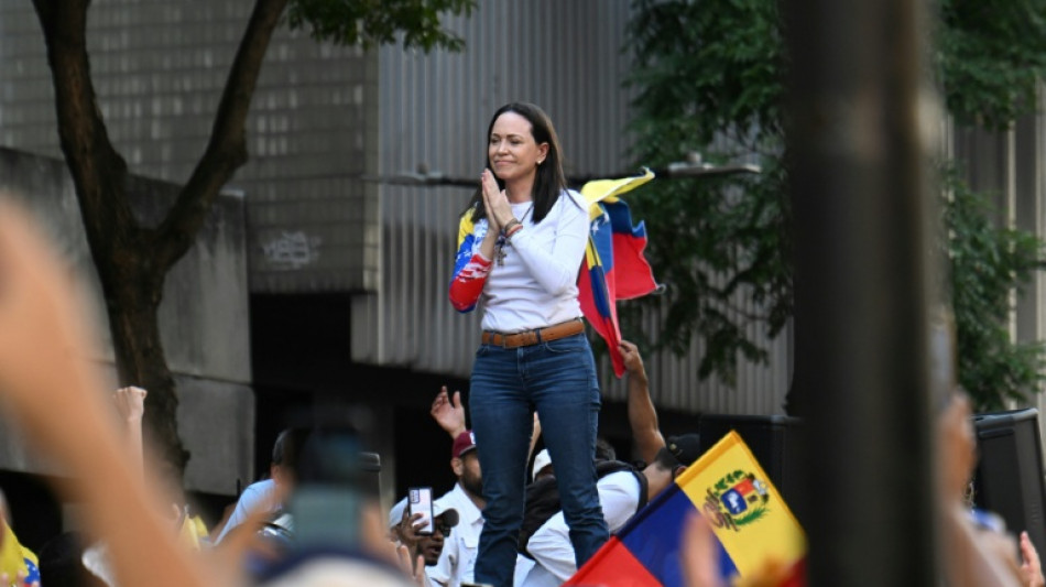 Venezuela opposition claims elusive leader briefly detained in Caracas protest