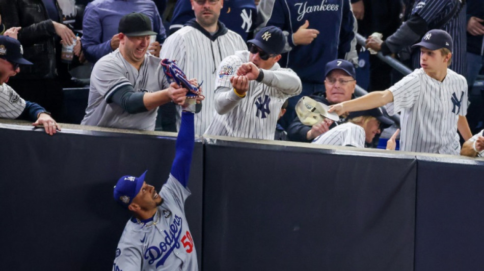 Two fans who grabbed Betts in World Series banned by MLB