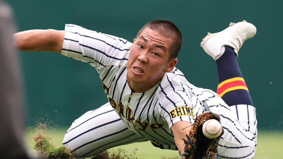 Tears and team spirit: high-school baseball grips Japan