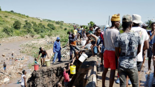 Without official aid, Durban flood victims dig themselves out