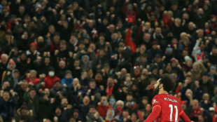 Liverpool put six past Leeds to cut Man City's lead