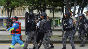 Ecuador police defuse bomb strapped to guard