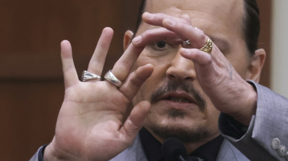 Johnny Depp says ex-wife severed his finger with thrown vodka bottle