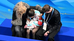 Broken Valieva falls out of medal places as team-mate wins skating gold