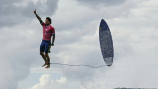 Photo sensation Medina takes Olympic surfing bronze for Brazil