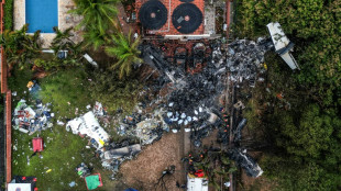 Workers begin recovering bodies from Brazil plane crash