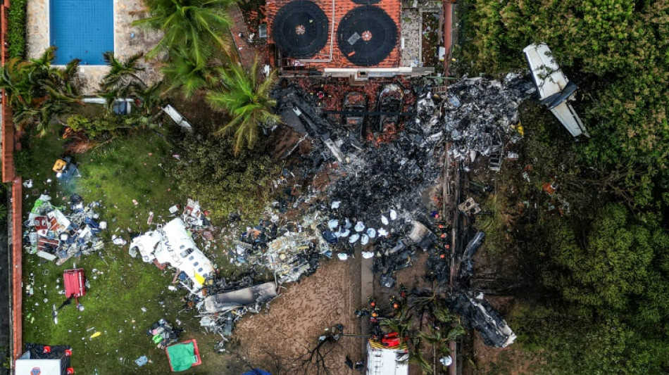 Workers recovering bodies from Brazil plane crash, inquiry underway